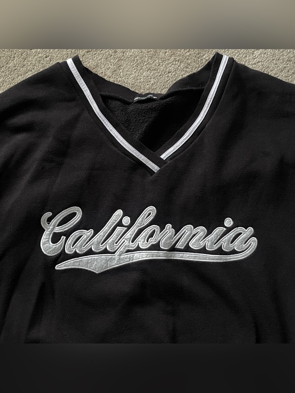 Oversized California Script V-Neck Sweatshirt in Black and White